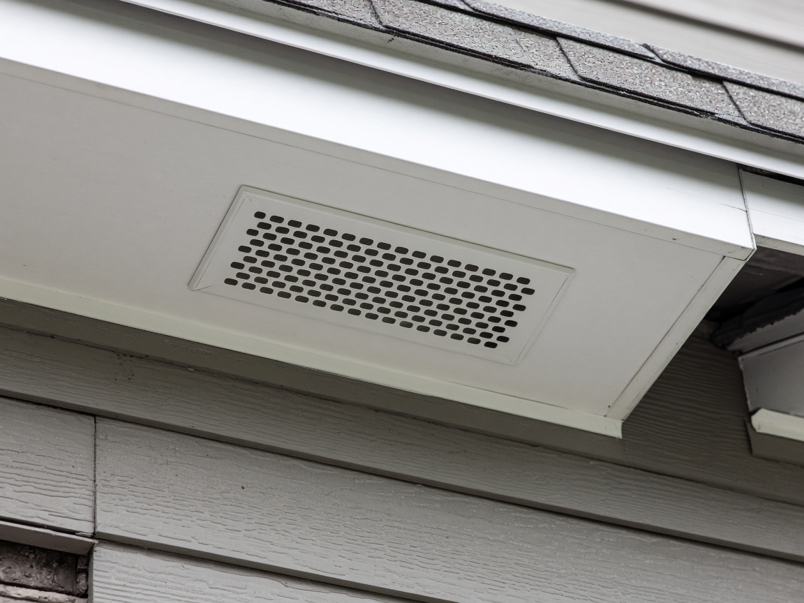 New soffit vent installed after wildlife damage